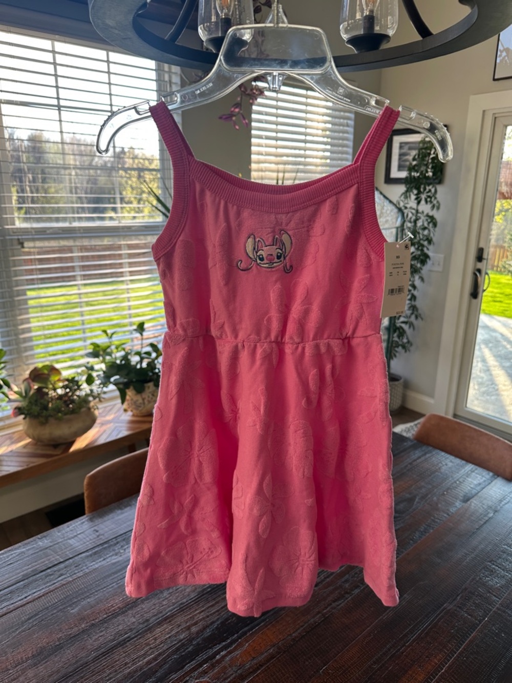 Embroidered Disney Stitch tank dress. Adorable flower pattern.